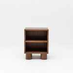 Wooden side table with two shelves on a white background
