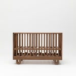 Solid wood Arche design baby cot in Walnut