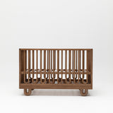 Solid wood Arche design baby cot in Walnut