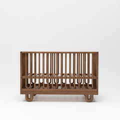 Solid wood Arche design baby cot in Walnut