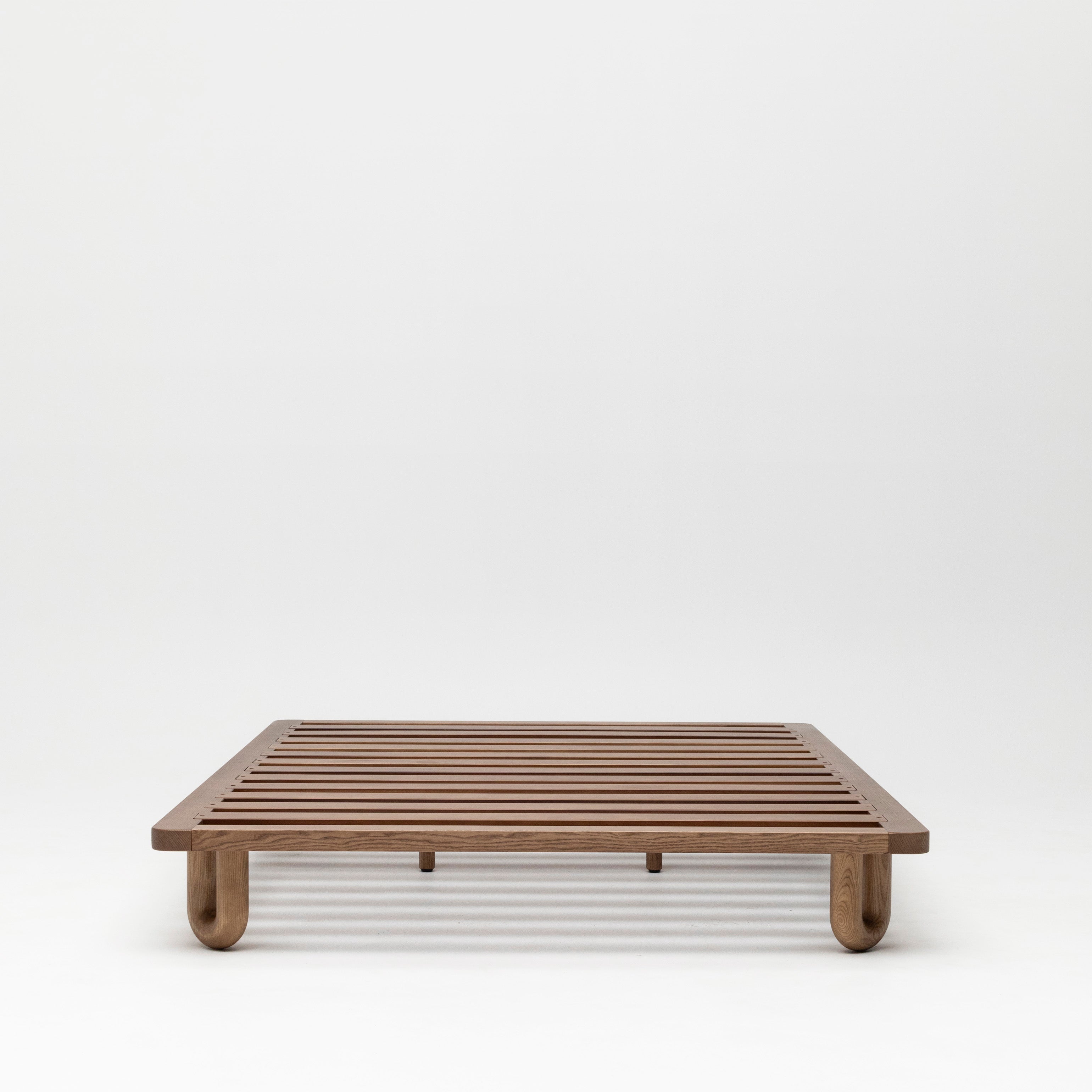 Arche Double Bed Walnut frame showing slats and curved Arche legs