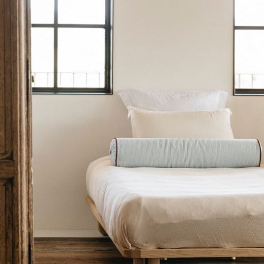 Bedroom featuring the Arche King Single Toddler Bed Ashwood and soft bedding and wood furnishings