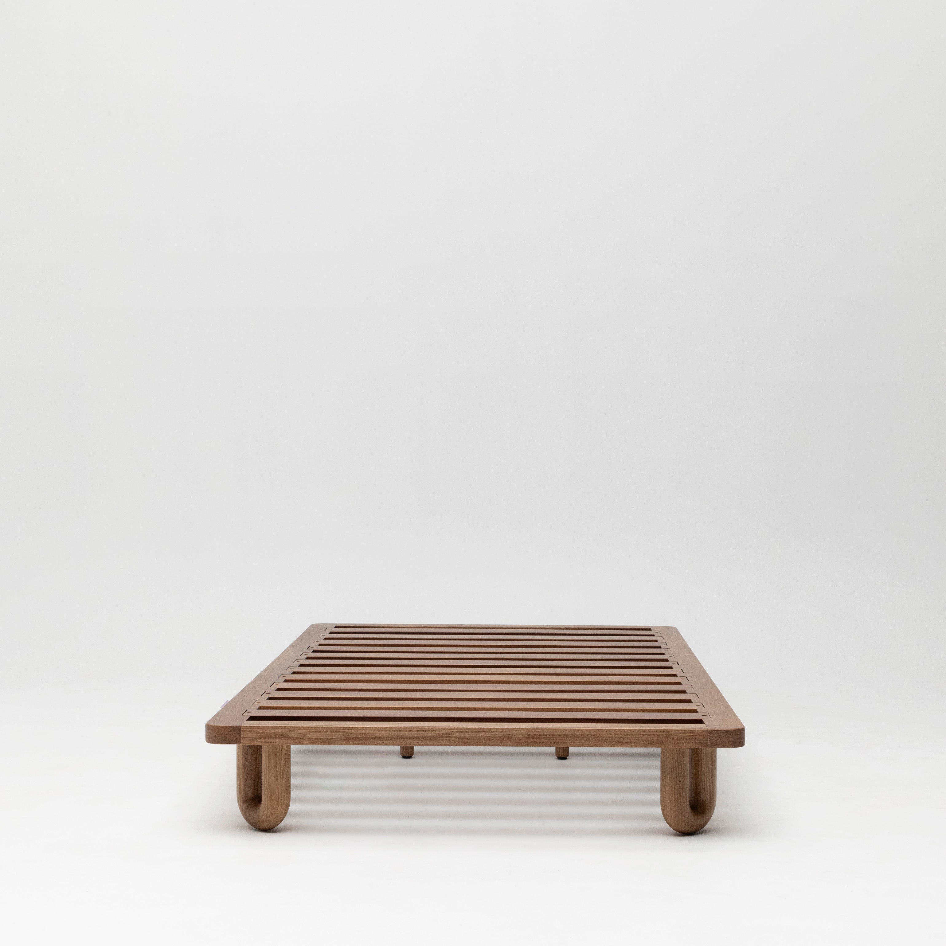 Arche King Single Bed Walnut frame shwing slats and arched, curved legs