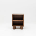 Wooden side table with two shelves on a white background