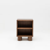 Wooden side table with two shelves on a white background