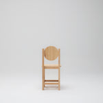 Timber ashwood kids chair with circular backrest on a plain background
