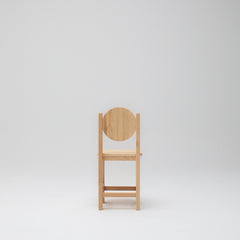 Timber ashwood kids chair with circular backrest on a plain background