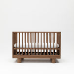 Walnut Wood Baby Cot with Solid Timber cylinder legs and round poles