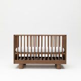 Walnut Wood Baby Cot with Solid Timber cylinder legs and round poles