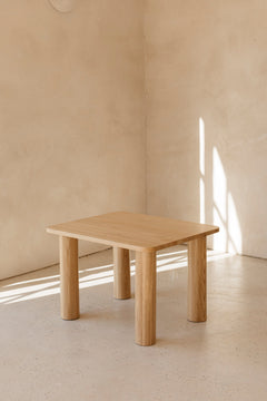 Hennie Ashwood Kids Table in a sunlit room showing the natural wood grain in the light