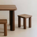 Hennie Kids Stool Walnut shown with the matching Walnut Kids Table in a children's room