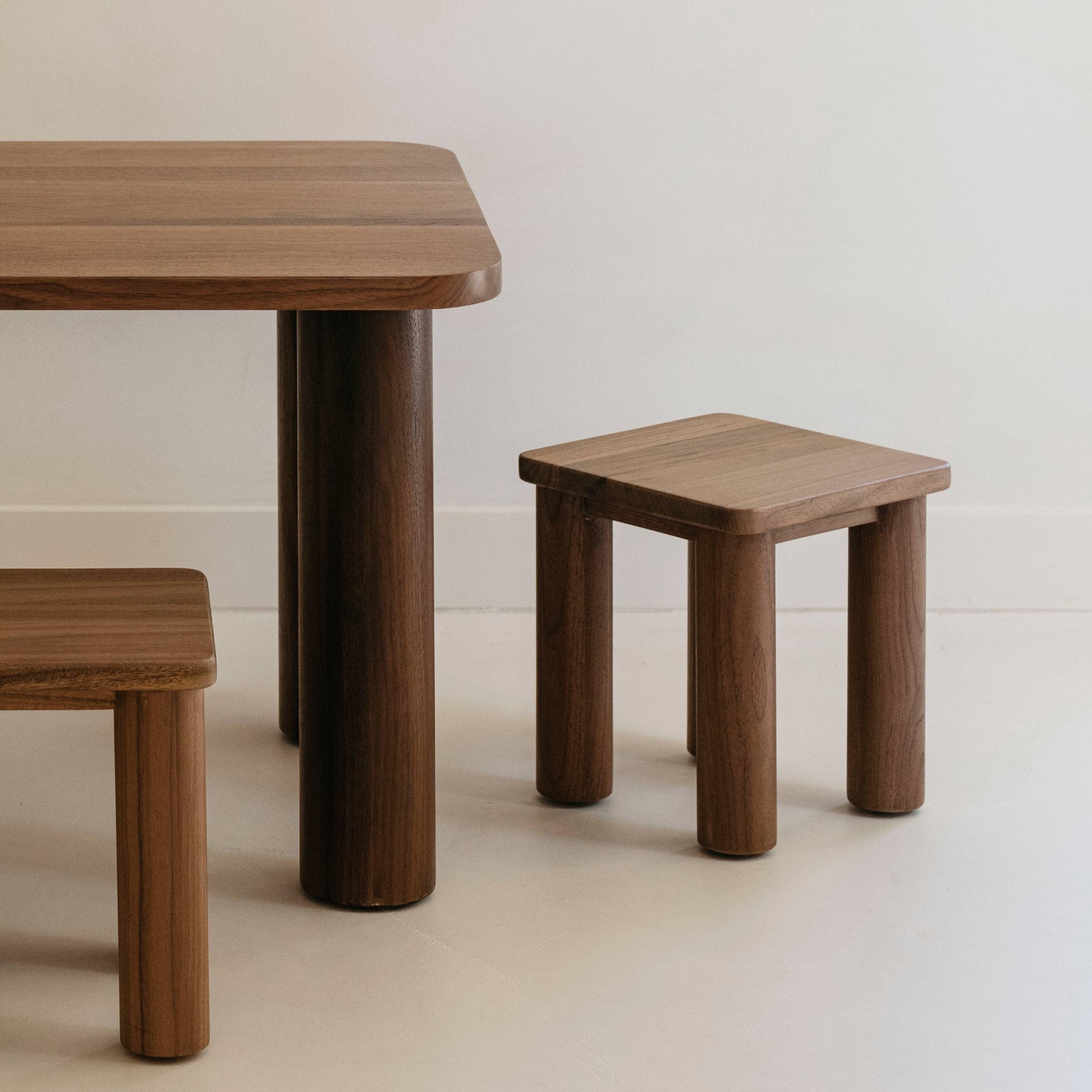 Hennie Kids Stool Walnut shown with the matching Walnut Kids Table in a children's room