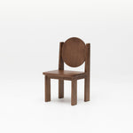Side view of solid wood Hennie Kids Chair in Walnut showing round circle backrest