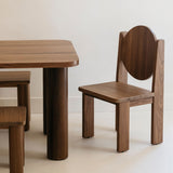 Hennie Kids Chair in Walnut shown with the matching Hennie Walnut Kids Play Activity Table 