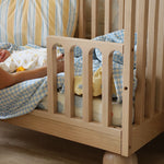 Solid wood Zali Ashwood Baby Cot with cotton linen