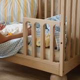 Solid wood Zali Ashwood Baby Cot with cotton linen