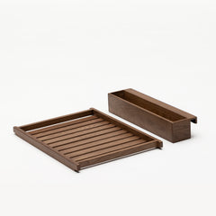 Ecomm image of the cot change table Walnut Space Saver and Caddy on white background