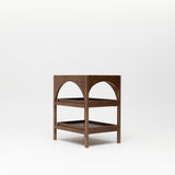 The Yoli Walnut Baby Change Table isolated on a white background showing arched design