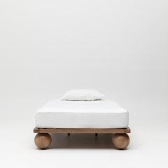 Zali King Single Bed Walnut on white background with single mattress andwhite duvet